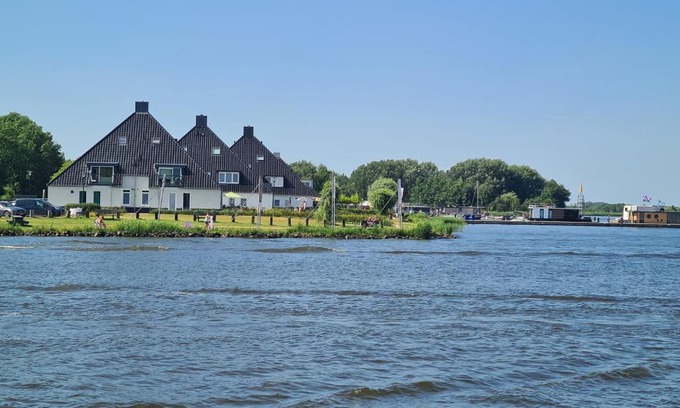 Offingawier Apartment | Relax in My Studio by the Snekermeer with Ocean Views