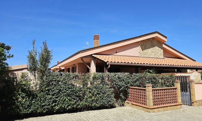 Solfarelli Villa | Bright Mediterranean Villa Steps from the Ocean with Garden
