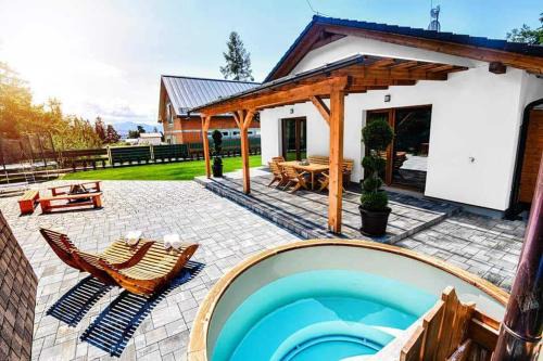 Pribylina Villa | Relax at Wellness Villa Bobrik with Hot Tub & Family Amenities