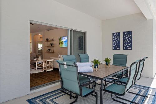 Palm Coast House | Cozy Whispering Palm: Fenced Pool Home for Families