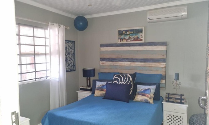 Kouga House | Ocean View Retreat at Whispering Waves - Rated 9/10 by Guests