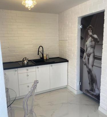 Elblag Apartment | Family-Friendly White Apartment with Hot Tub & Great Reviews