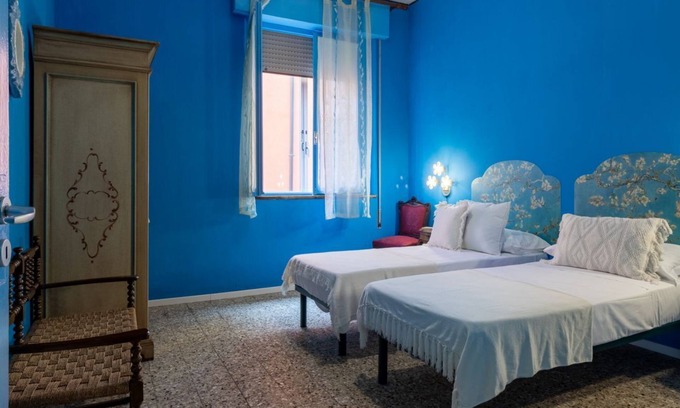 Ferrara Apartment | Discover White Cross Square: A Touch of Blue Apartment