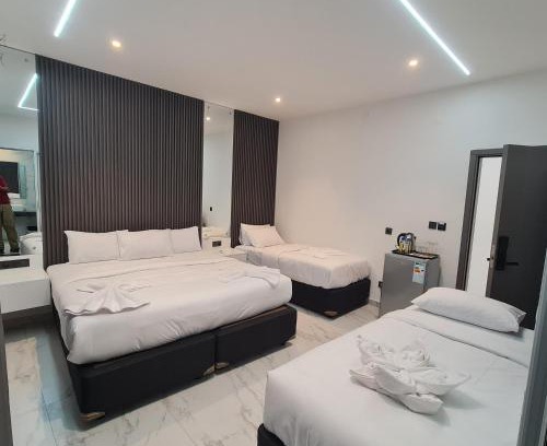 Central B Hotel | Budget-Friendly White Garden Hotel with Complimentary Breakfast
