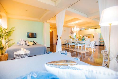 Tairagawa Apartment | Welcoming White House: A Family-Friendly 4-Star Retreat