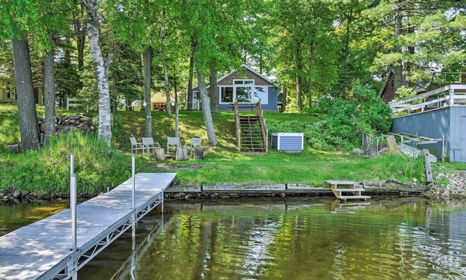 Weyauwega Cottage | Inviting White Lake Home with Patio, Fire Pit & Boat Dock