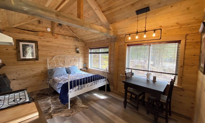 Lanark Cabin | White Pine Acres Cozy couples cabin in lanark private on a large pond & pines