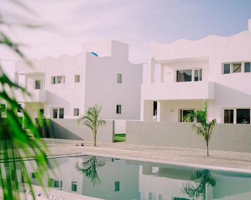 Dodoma Apartment | Welcoming White Residence Dodoma with Pool & Pet Amenities