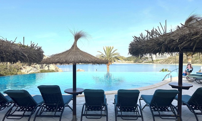 Arenal d'en Castell Apartment | Oceanfront Escape at White Sands 201 with Pool & Spa
