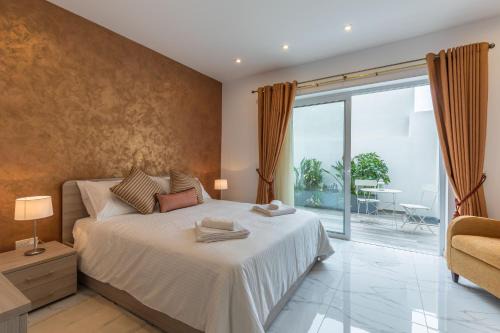 Ta' Pennellu Apartment | White Sands: 4-Star Retreat with a 9.9/10 Guest Rating