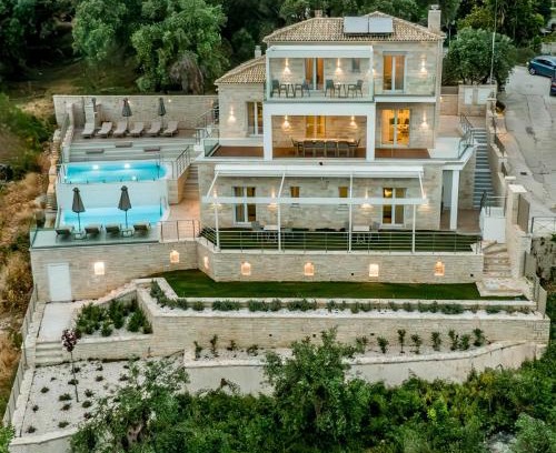 Anthousa Villa | Discover White Villas: Oceanfront Oasis with Pool Access