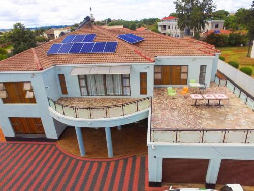 Harare Villa | Inviting WhiteHouse Lodge with Pool and Family Amenities