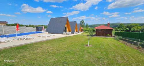 Baile Felix Ski Chalet | Exceptional Wild A-frame with Ocean View & Pool Access
