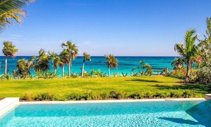 North Palmetto Point House | Oceanfront Wild Orchid 4 Bedroom Home with Kid-Friendly Kitchen