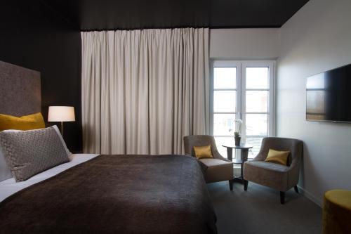 Tonsberg Hotel | Elegant Wilhelmsen House: 4-Star Comfort with Spa & Hot Tub