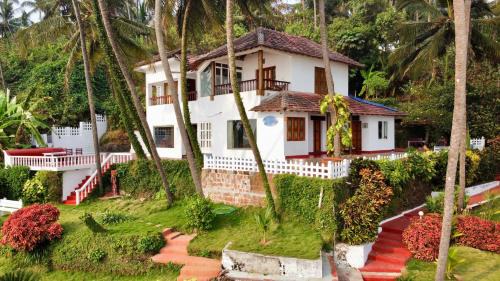 Kannur House | Beachfront Bliss at Willo Stays - Relax with Ocean Views