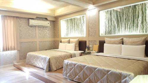 North District Hotel | Budget-Friendly Getaway at Wind Coast Motel for Families