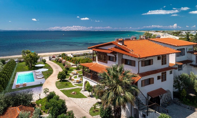 Kalivia Poliyirou Villa | Beachfront Windmill Villa with Private Garden & Ocean View
