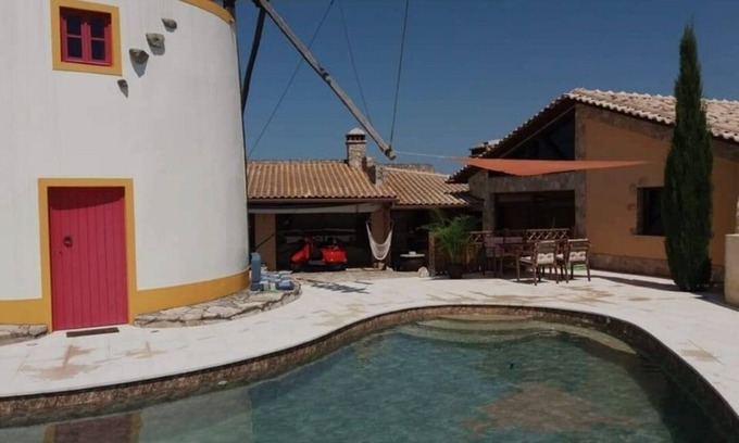 Alcobaca House | Elegant Windmill Retreat with Private Saltwater Pool