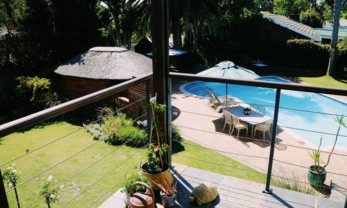 Tokai Bed & Breakfast | Discover Windsor House: Ocean Views & Poolside Relaxation