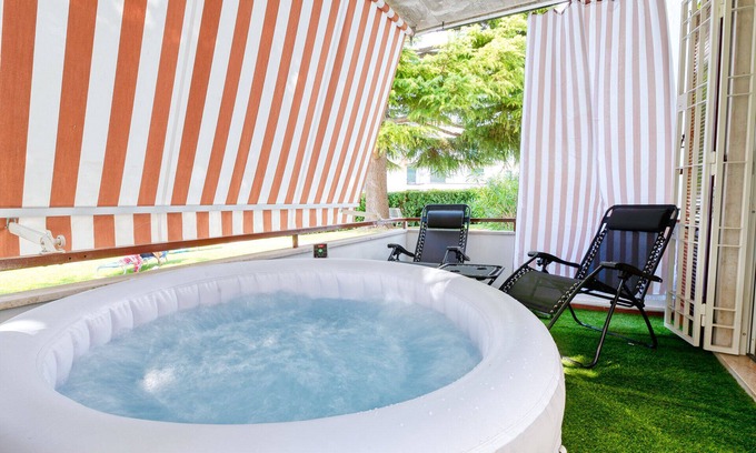 San Benedetto di Lugana Apartment | Unwind at Wolf House - Peschiera with Private Jacuzzi