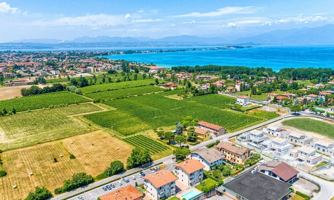 San Benedetto di Lugana Apartment | Unforgettable Wolf House Experience in Sirmione, Perfect Getaway