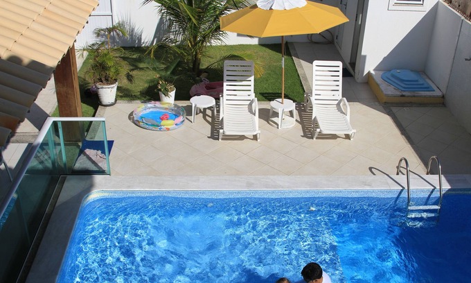 Caueira House | Idyllic Getaway at Caueira Beach with Oceanfront Pool