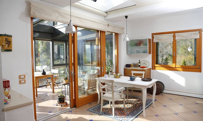 Cerano d'Intelvi Apartment | Wonderful living in villa in the garden. View of mountains, lake, many attractions.