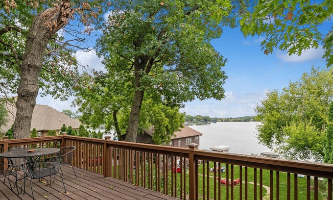 Antioch House | Inviting Waterfront Log Home at Chain o' Lakes with Pier