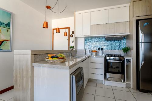 Itapiruba Apartment | Stunning Vista Maravilhosa: Beachfront Apartment Awaits