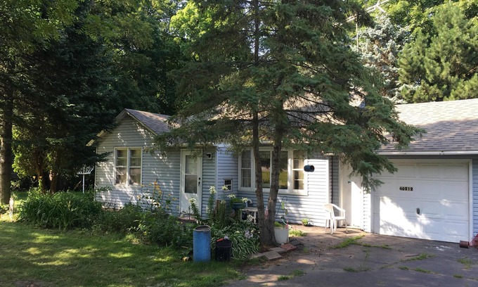 Onamia House | Cozy Porch Retreat at Randy's Rentals with Pet-Friendly Touch
