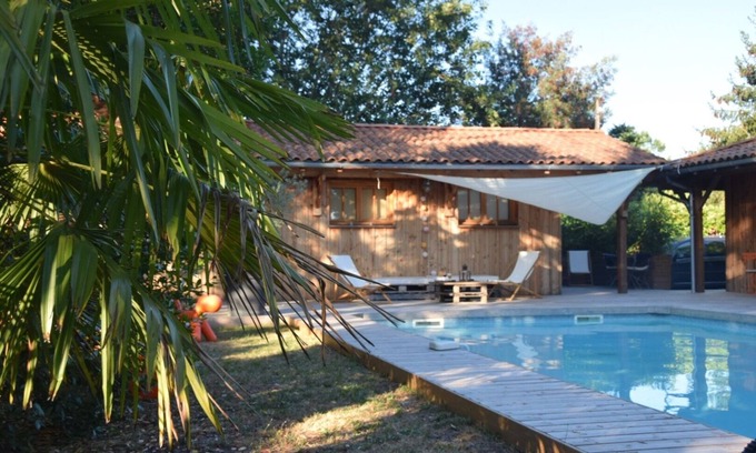 Saint-Jean-d'Illac House | Inviting Wooden House near Bordeaux with Ocean View & Pool