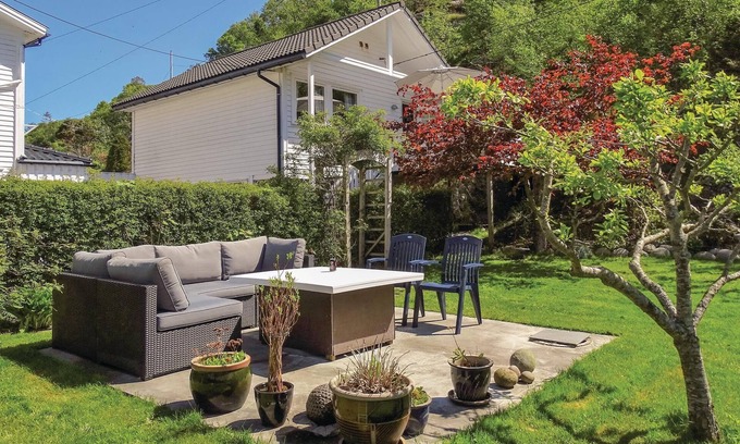 Flekkefjord House | Experience a Scenic Vacation in Åna Sira with Lake Views