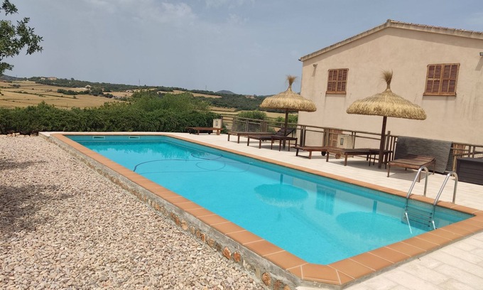 Manacor Cottage | Experience Breathtaking Views with Private Pool Access