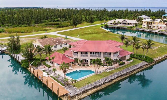 West End House | Waterfront Retreat with Ocean Views and Private Airstrip