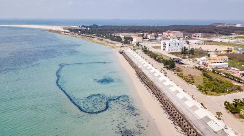 Baisha House | Serene Oceanfront Retreat at Xiang Xie Min Su