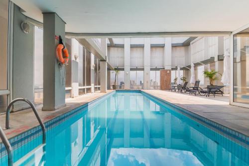 Guarulhos City Centre Apartment | Discover Xtay Guarulhos Aeroporto: Family-Friendly Retreat