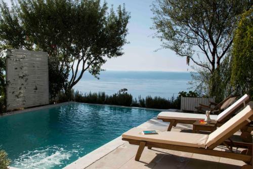 Athani Villa | Relax at Yades Villas: Oceanfront, Pet-Friendly Getaway