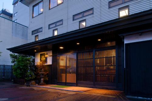 Asamushi Onsen Hotel | Family-Friendly Retreat at Yadoya Tsubaki with Hot Tub