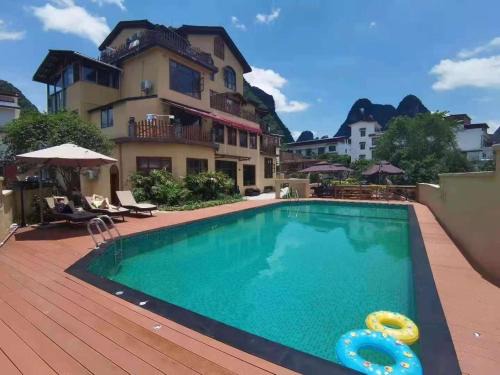 Yangshuo House | Relax at Yangshuo Coco Garden Hotel with Hot Tub & Dining