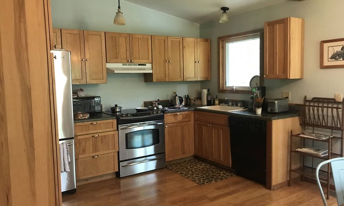 Lake Ann Cottage | Ultimate Getaway: Year Round Fun with Ocean Views & Spa