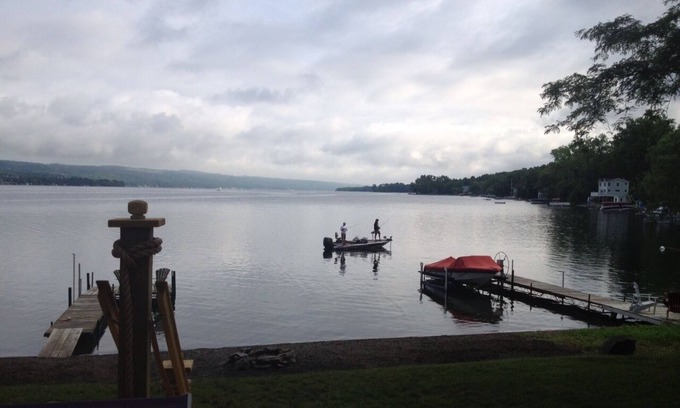 Town of Milo Cottage | Enchanting Lakefront Retreat with Pool and Spa Amenities