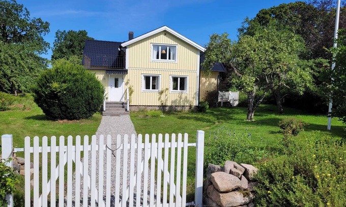 Troxhult Cottage | Inviting Yellow Country House in Scenic Småland