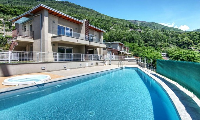 Gera Lario Apartment | Inviting Yellow Lake View: Poolside Escape for Families