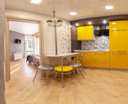 Sukhinovka Apartment | Yellow Loft: 2-Bedroom Getaway with Breakfast Included