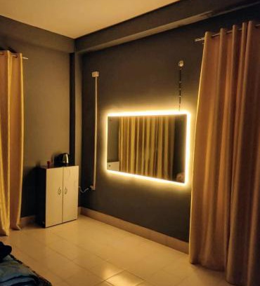 Jorhat House | Yellow minimalistic room
