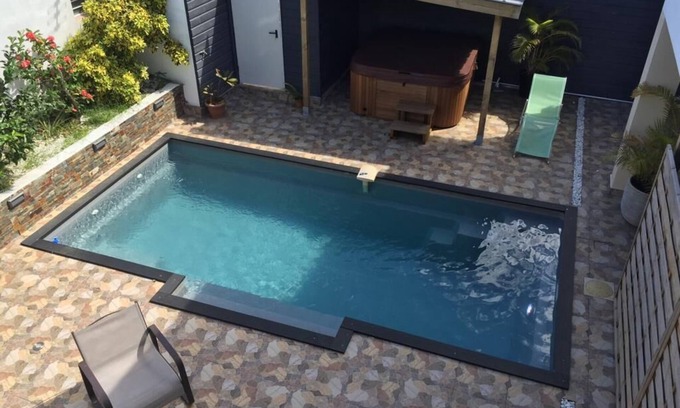 Saint-Andre Apartment | Ylang Residence: Heated Pool, Hot Tub, Pet-Friendly Getaway