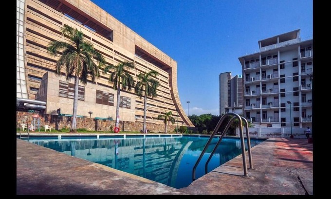 Connaught Place Hotel | Budget-Friendly YMCA Tourist Hostel with Pool & Restaurant