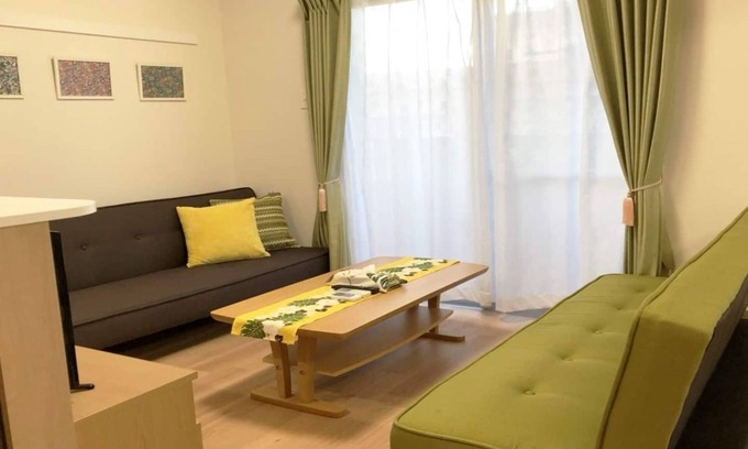 Tomigusuku Apartment | Modern YN12 Condominium Near Airport with Family Amenities