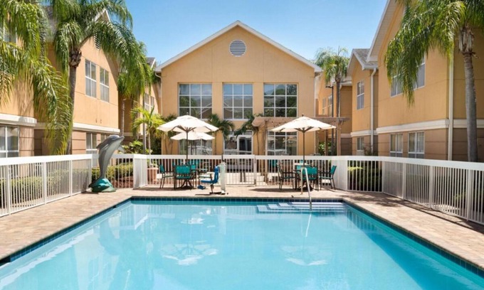 Feather Sound Hotel | Your Perfect Getaway: Free Breakfast & Outdoor Pool!